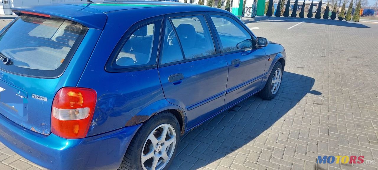 2001' Mazda 323 photo #4