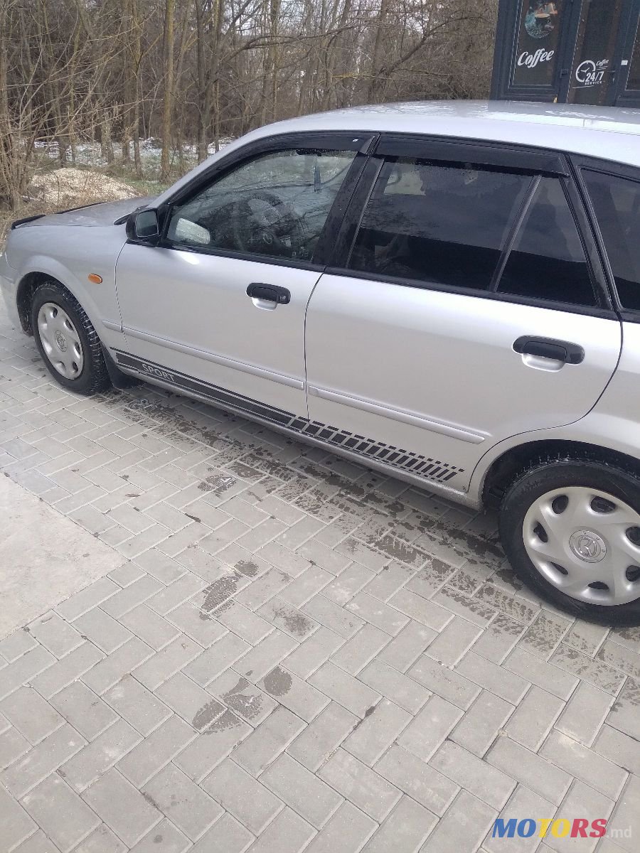 2003' Mazda 323 photo #2