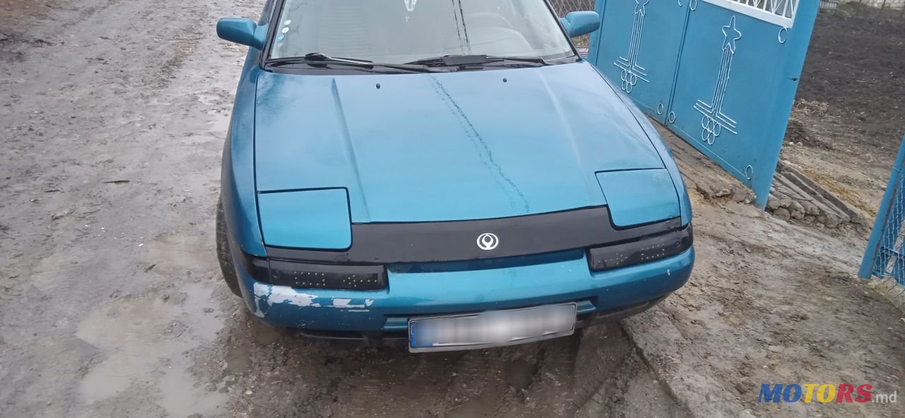 1994' Mazda 323 photo #1