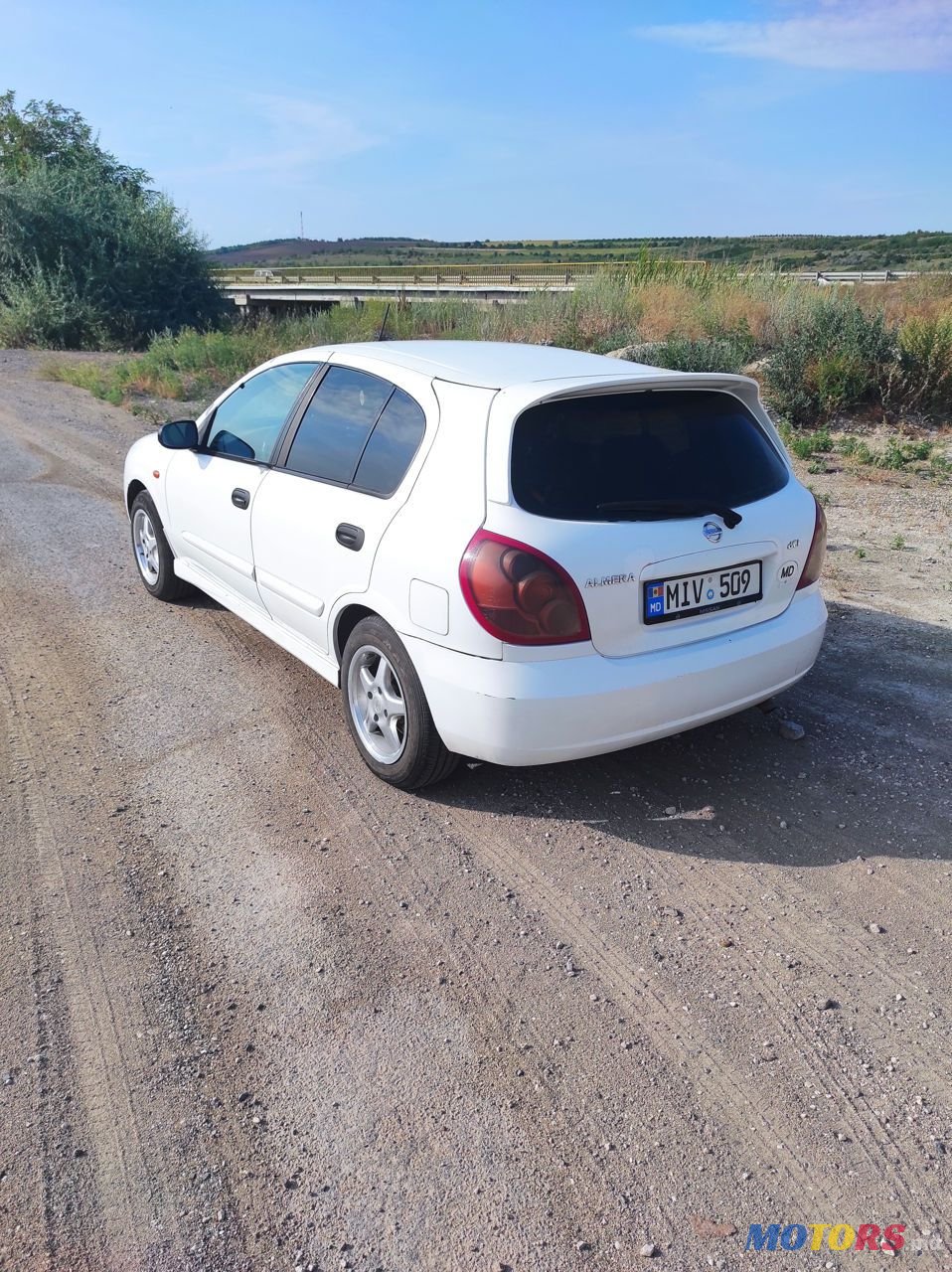 2004' Nissan Almera photo #2