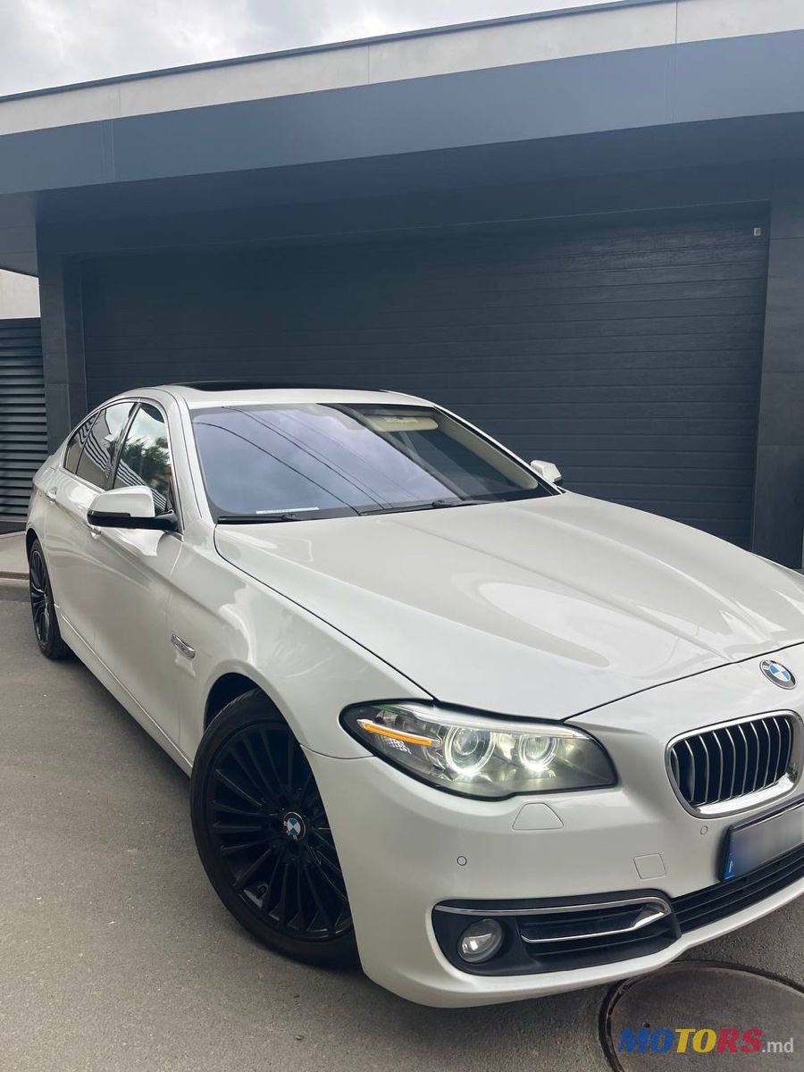 2014' BMW 5 Series photo #1