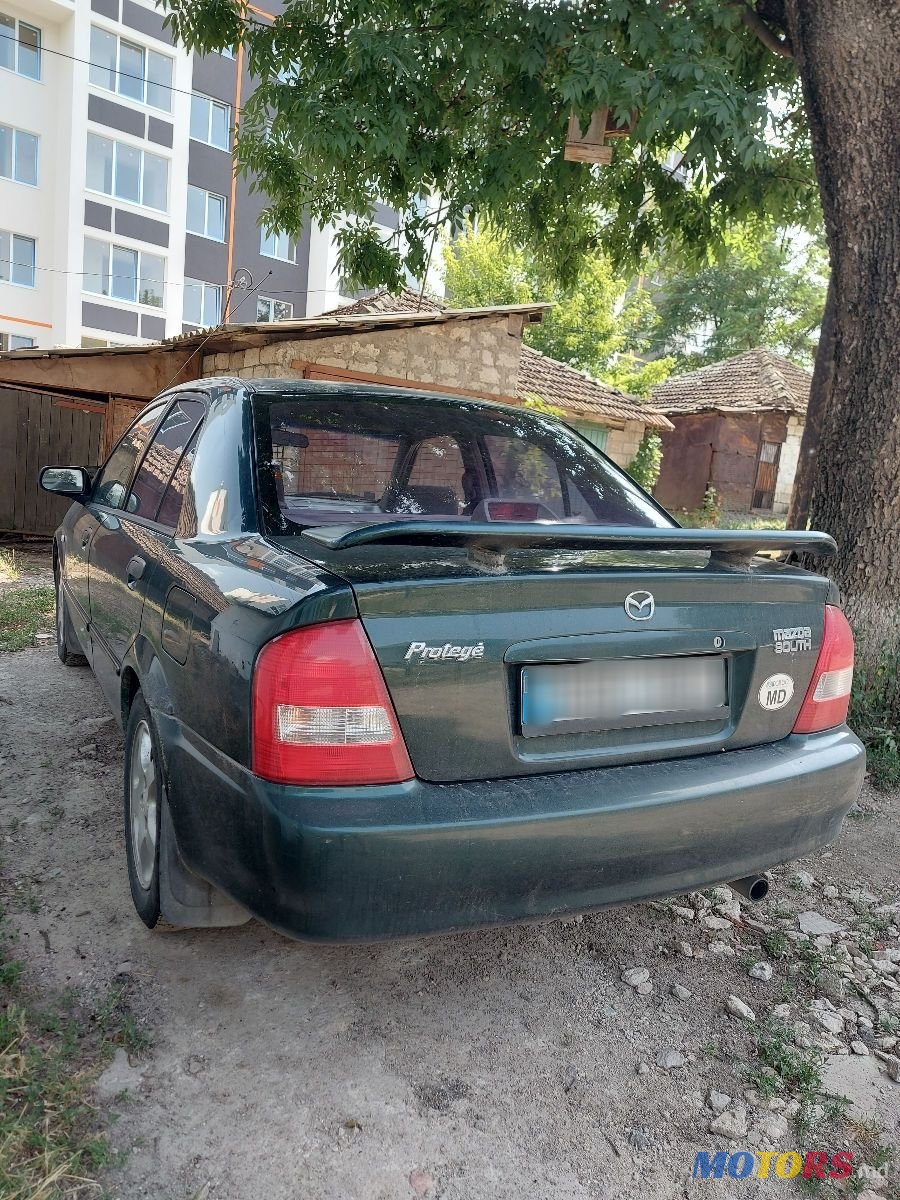 2004' Mazda 323 photo #3