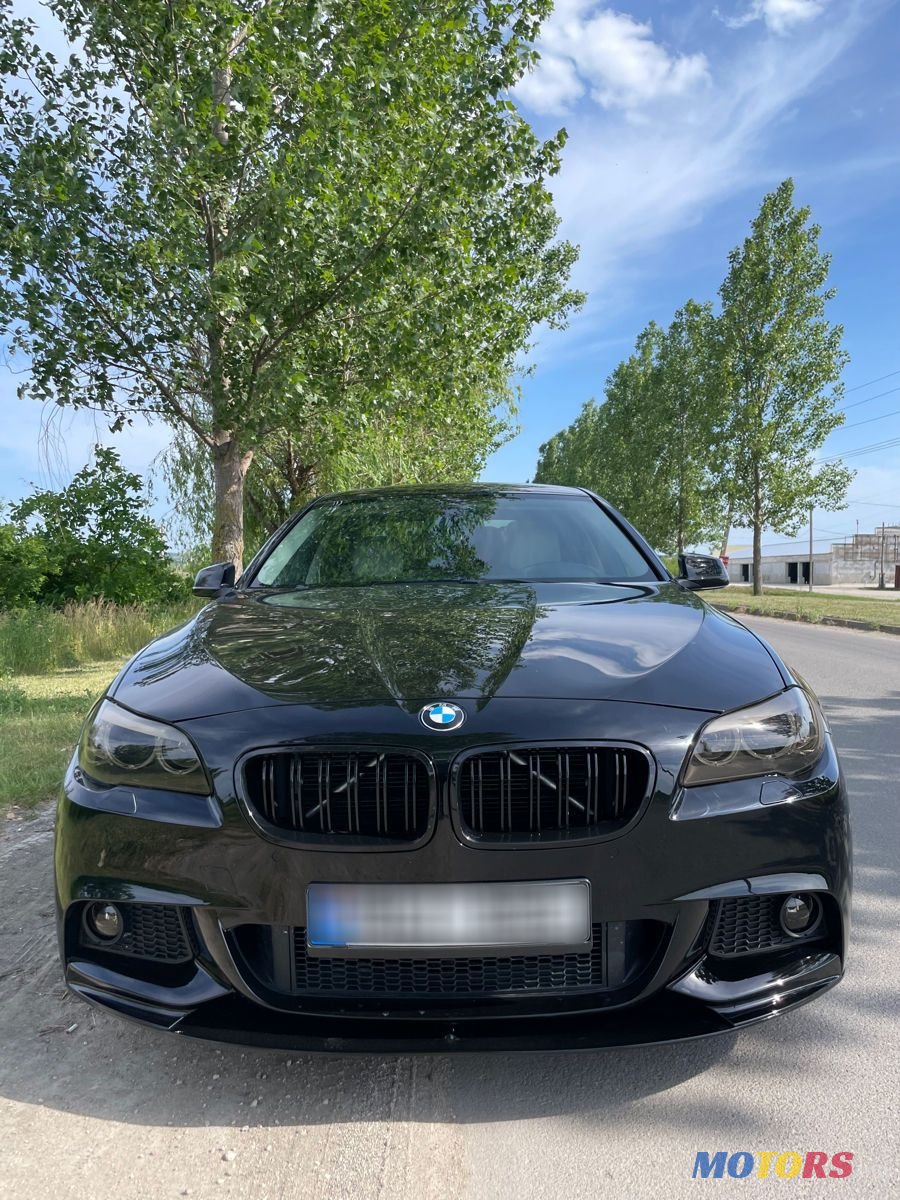 2014' BMW 5 Series photo #1