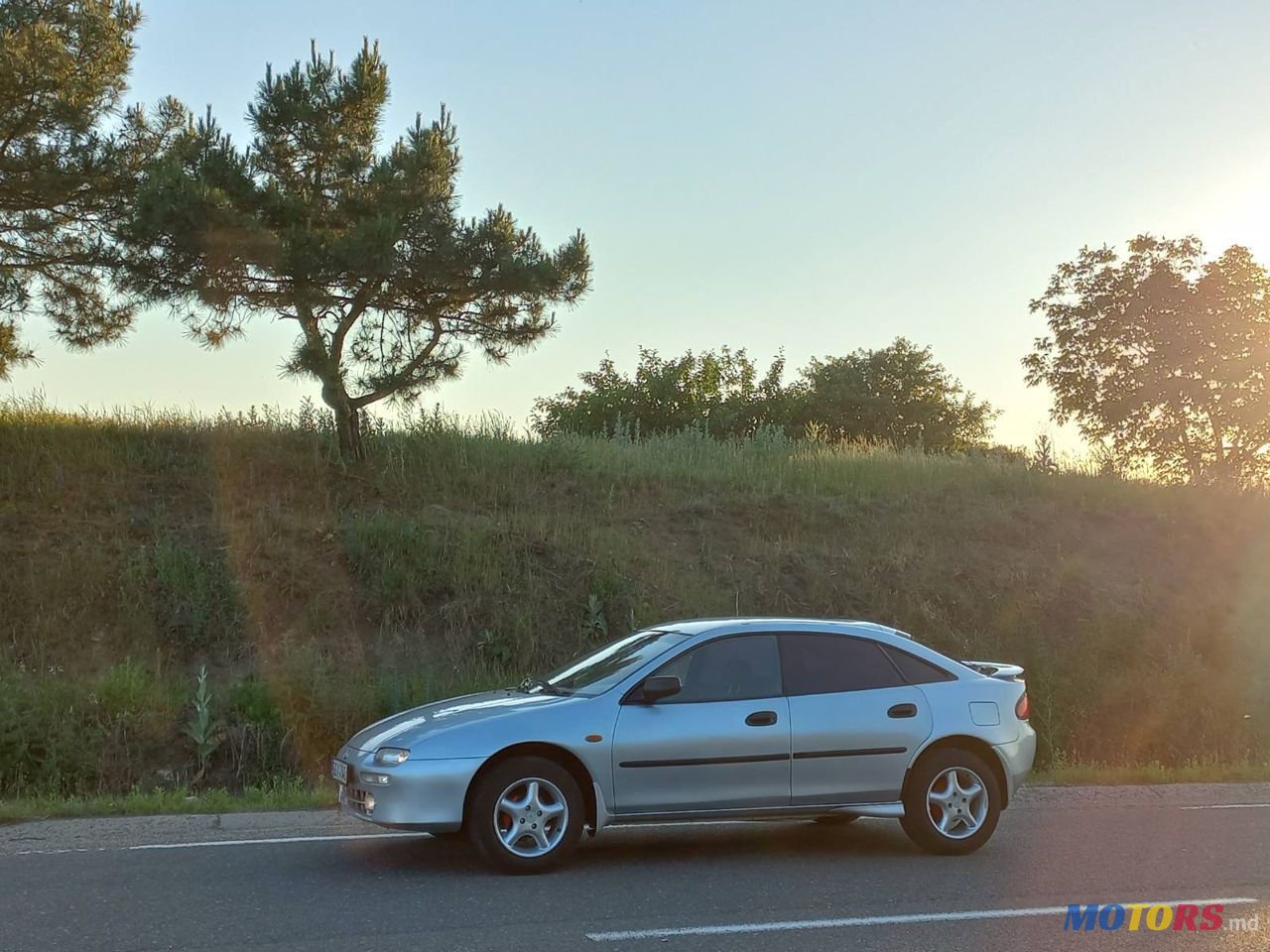 1998' Mazda 323 photo #1