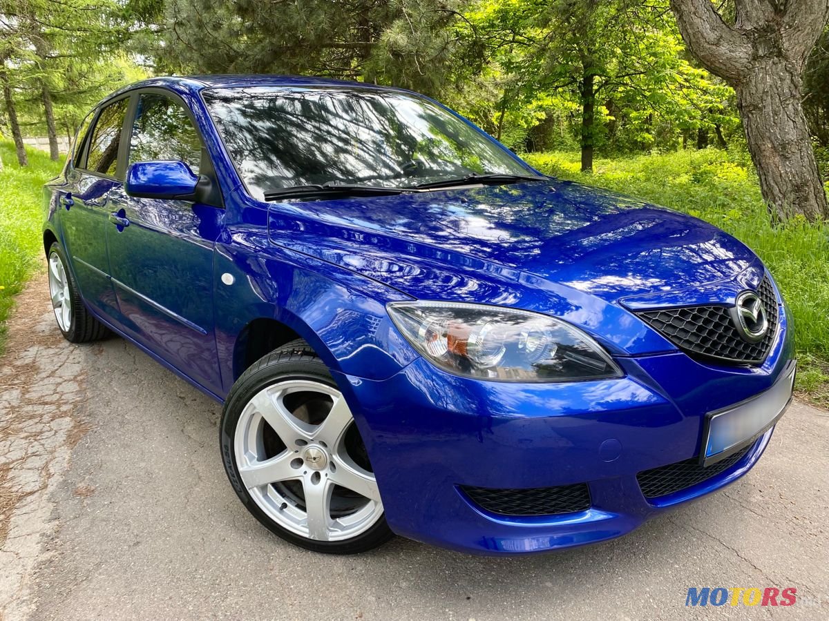 2004' Mazda 3 photo #1