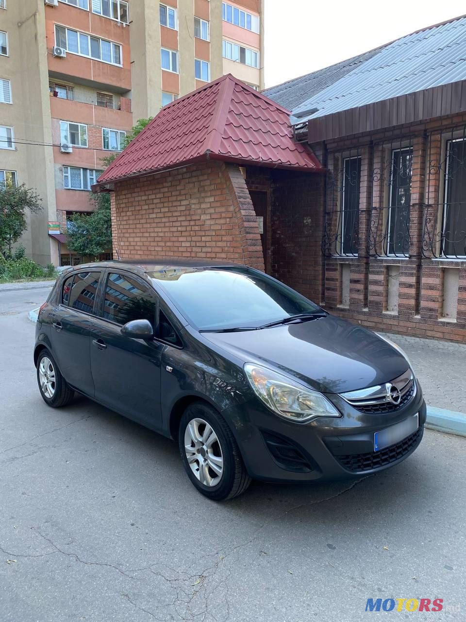 2013' Opel Corsa photo #1