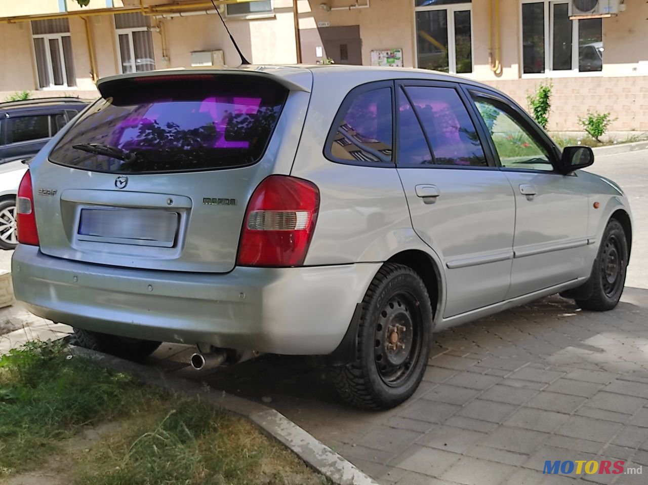 2001' Mazda 323 photo #4