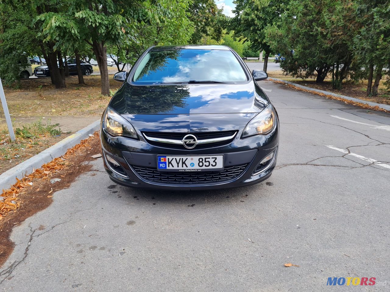 2013' Opel Astra photo #1
