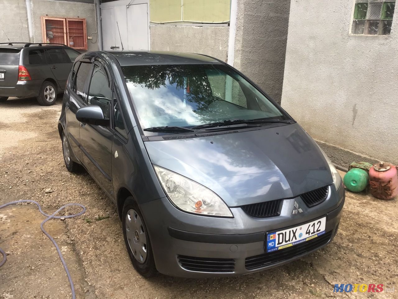 2005' Mitsubishi Colt photo #1