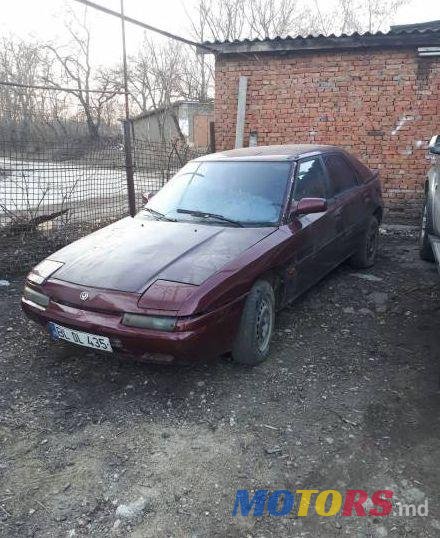 1995' Mazda 323 photo #1