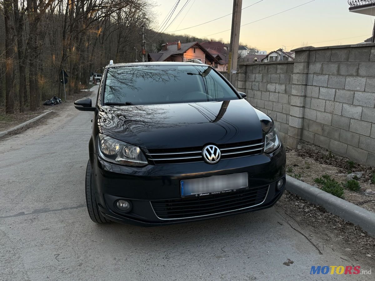 2014' Volkswagen Touran photo #3
