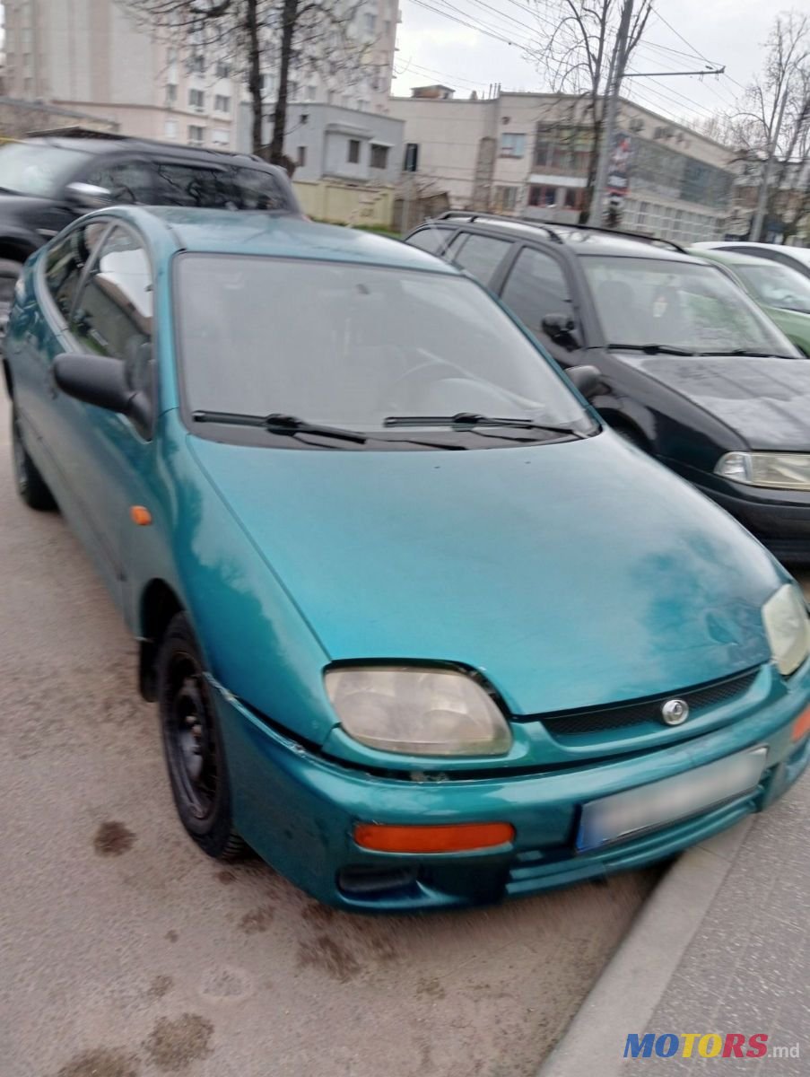 1995' Mazda 323 photo #1