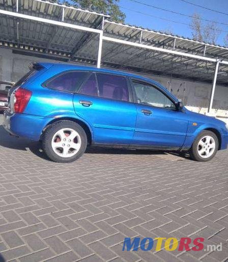 2003' Mazda 323 photo #1