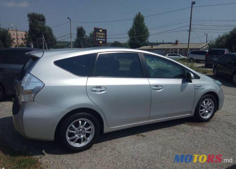 2014' Toyota Prius + photo #1