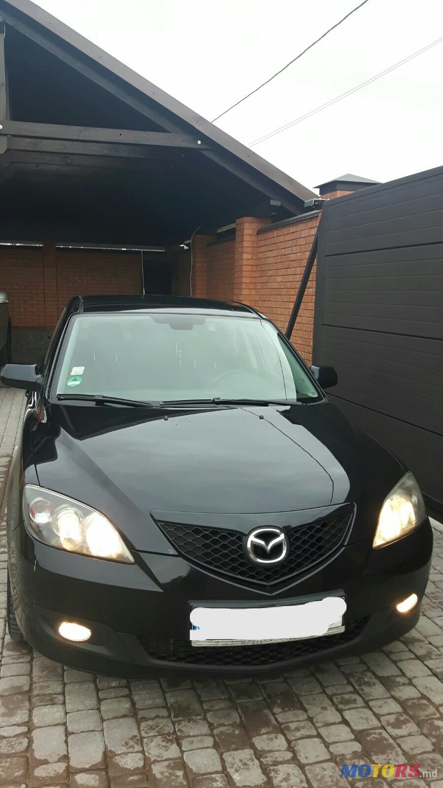 2007' Mazda 3 photo #1