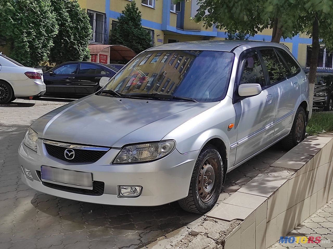 2001' Mazda 323 photo #5