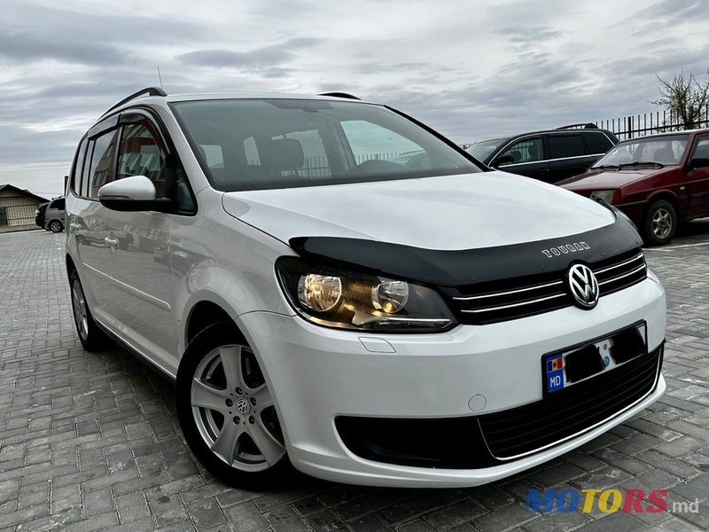2014' Volkswagen Touran photo #1