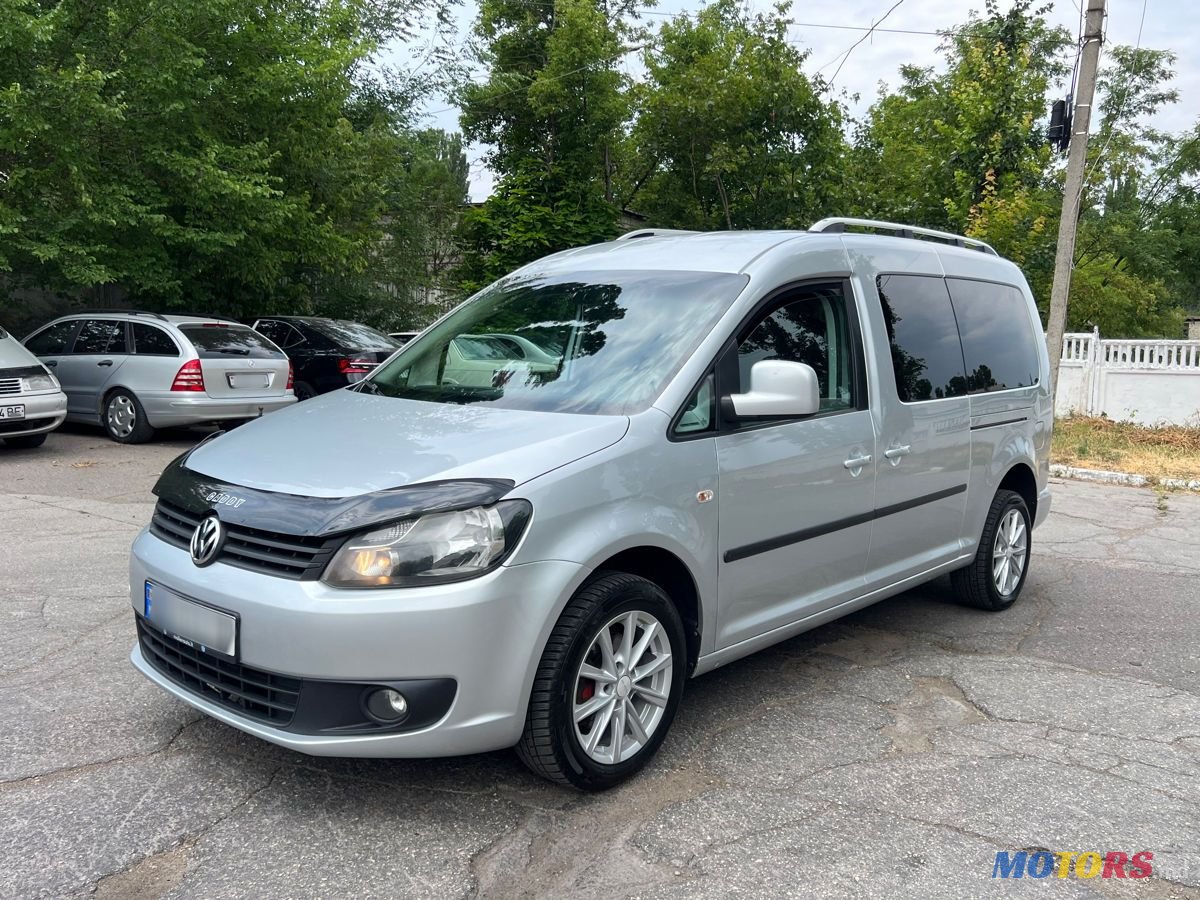 2011' Volkswagen Caddy photo #1