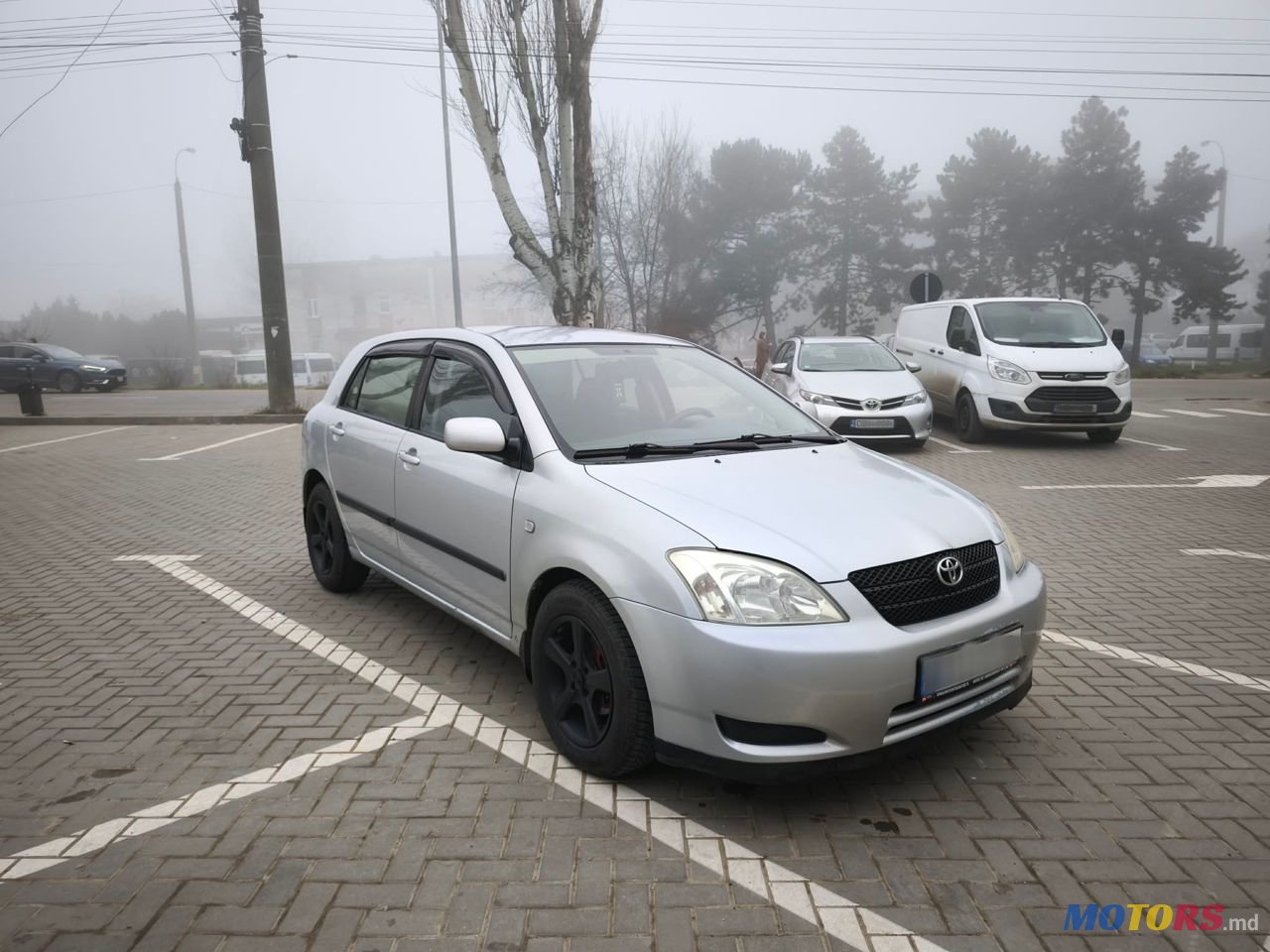 2004' Toyota Corolla photo #3