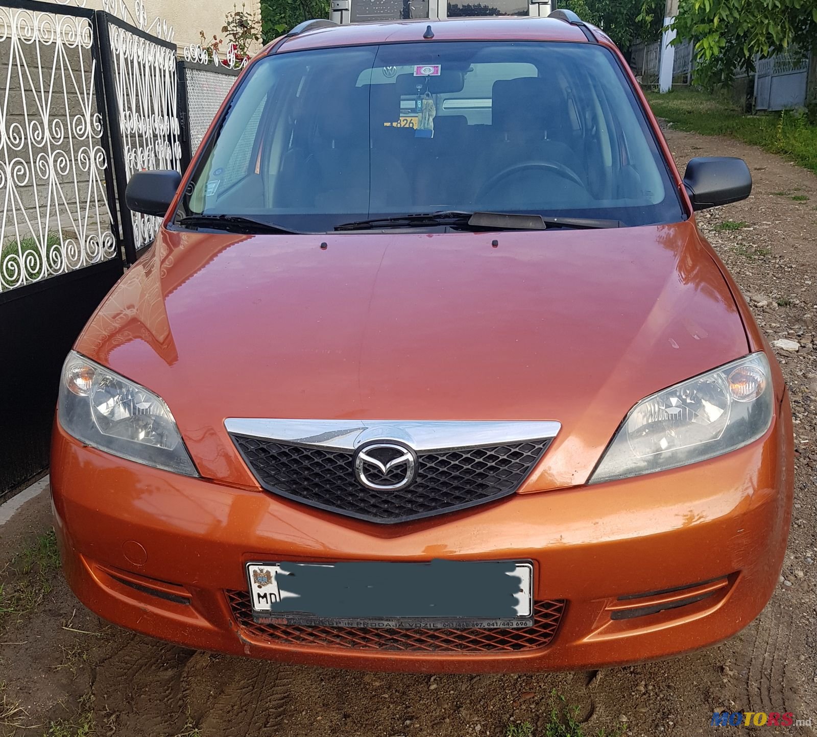 2004' Mazda 2 photo #1