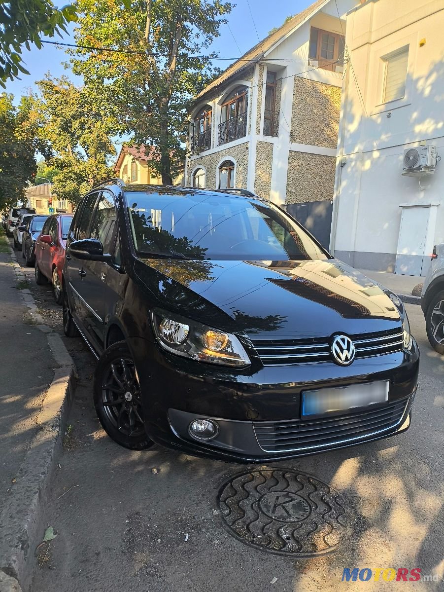 2014' Volkswagen Touran photo #3