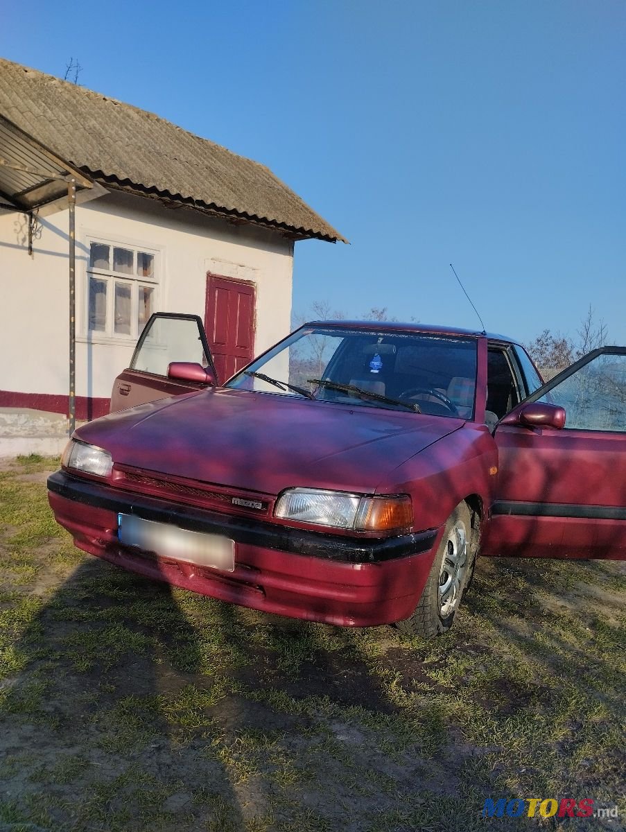 1993' Mazda 323 photo #1