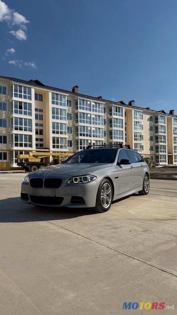 2014' BMW 5 Series Touring photo #1