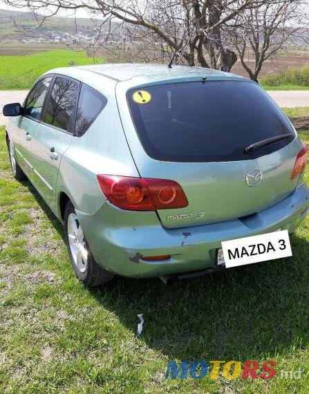 2004' Mazda 3 photo #1