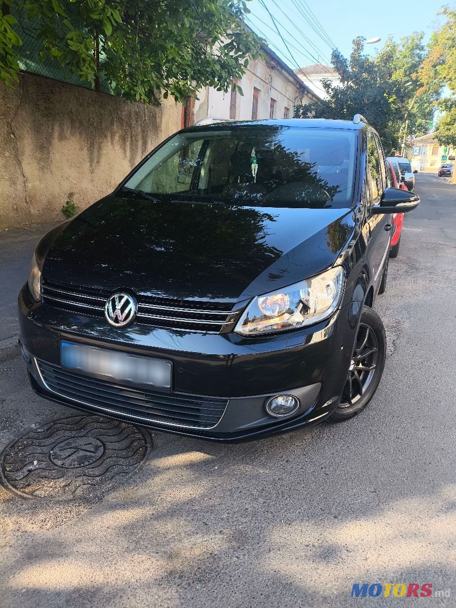 2014' Volkswagen Touran photo #1
