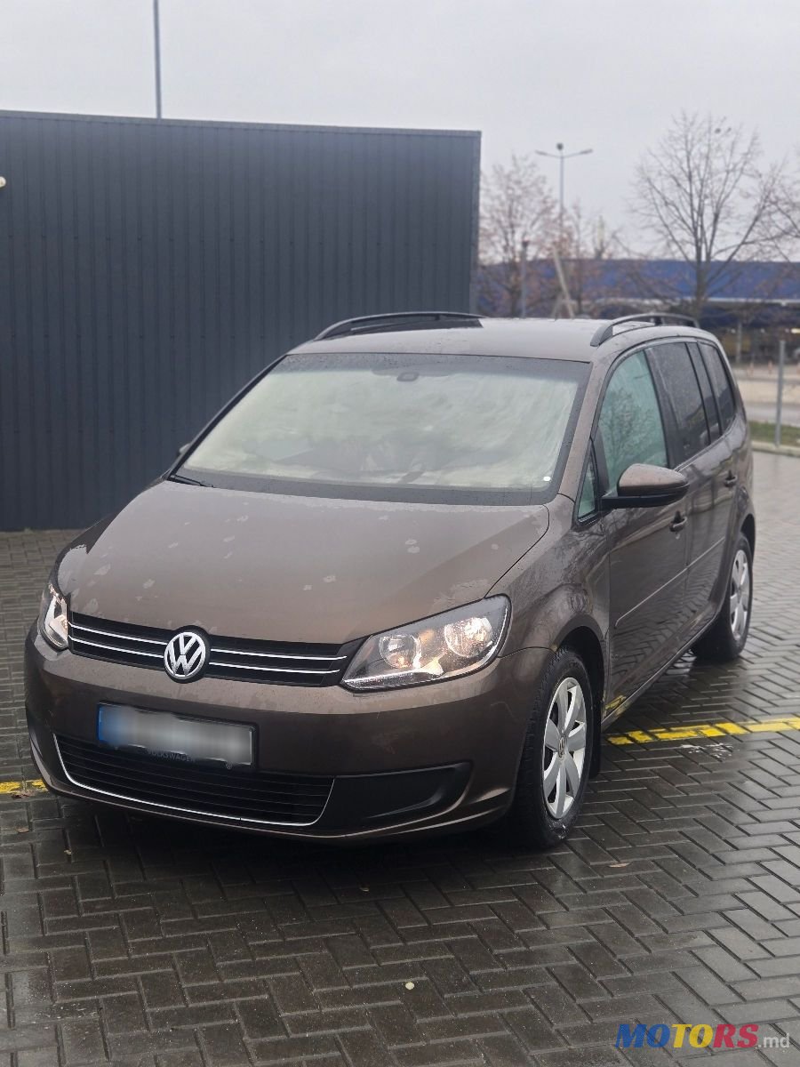 2010' Volkswagen Touran photo #1