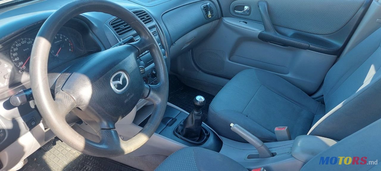 2001' Mazda 323 photo #5