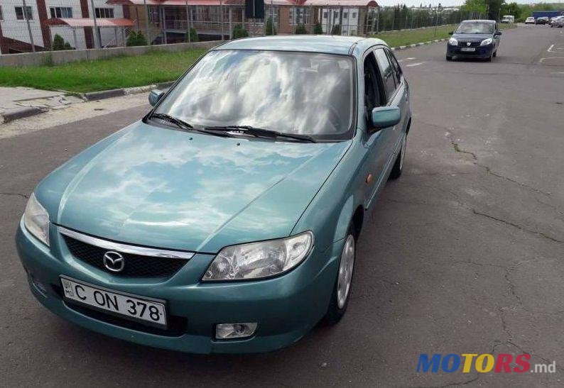 2002' Mazda 323 photo #1