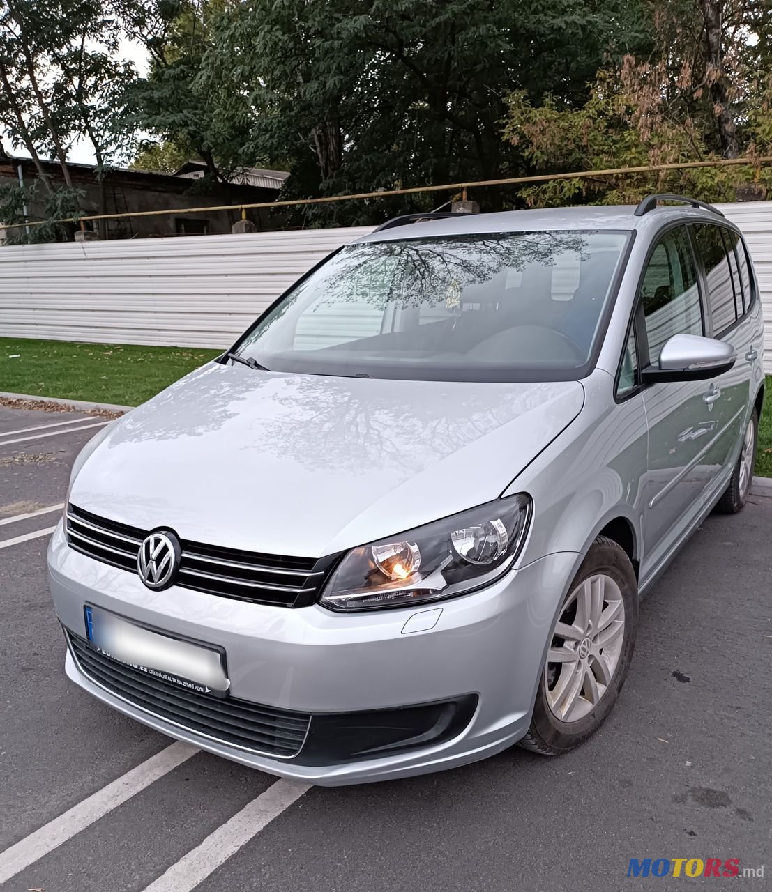 2012' Volkswagen Touran photo #1