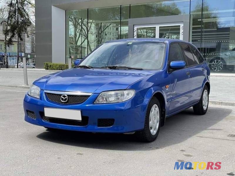 2003' Mazda 323 photo #1