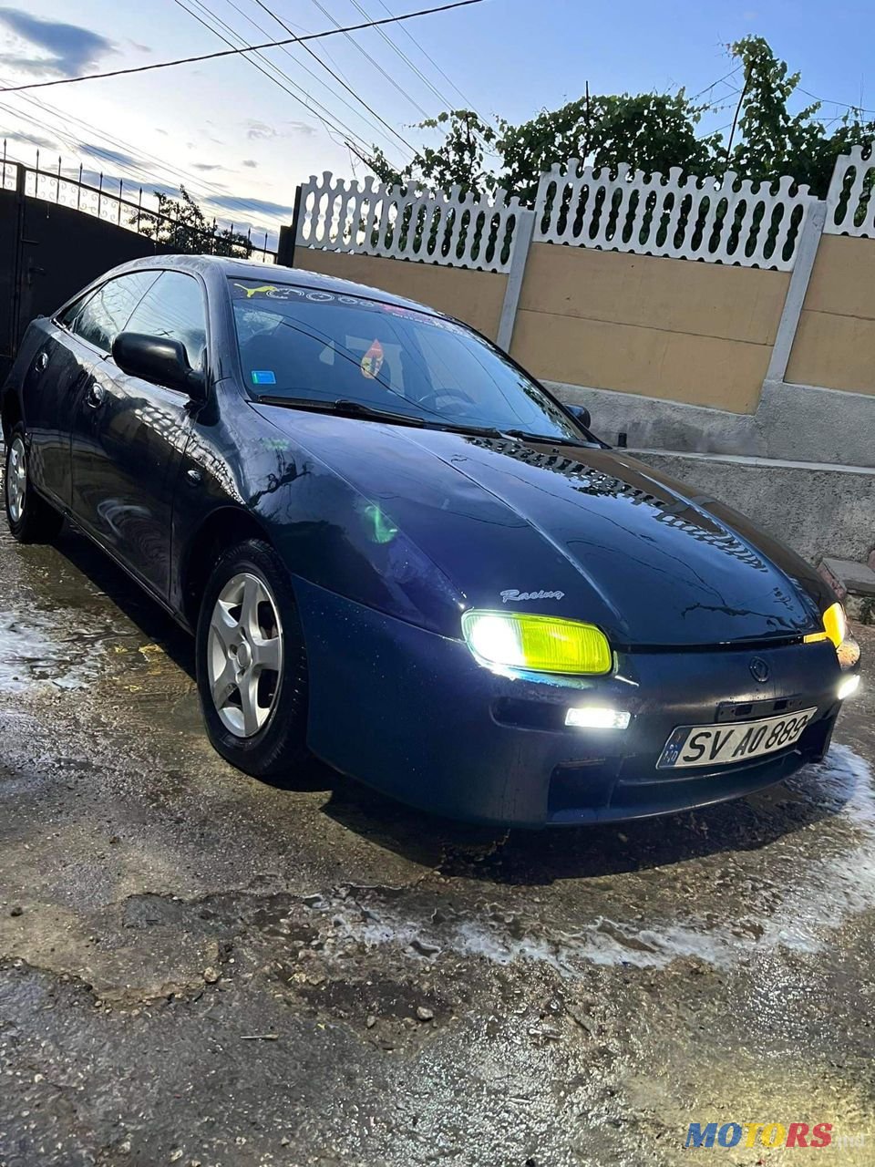 1995' Mazda 323 photo #1