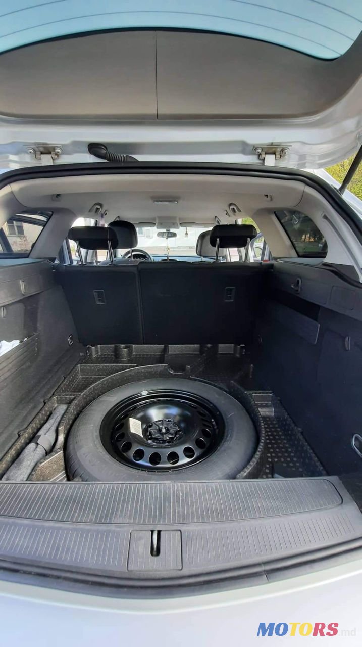 2013' Opel Astra photo #4