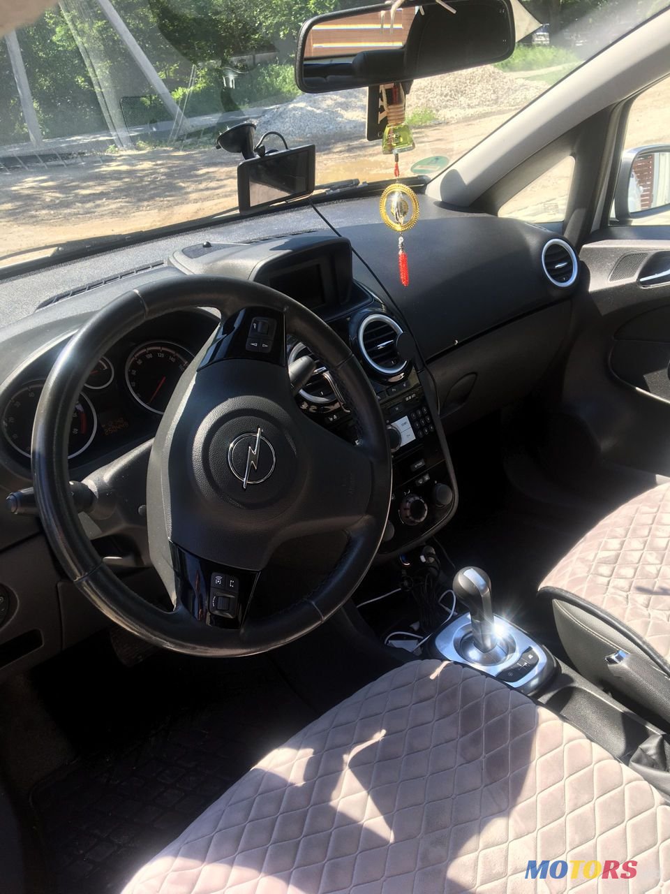 2009' Opel Corsa photo #3