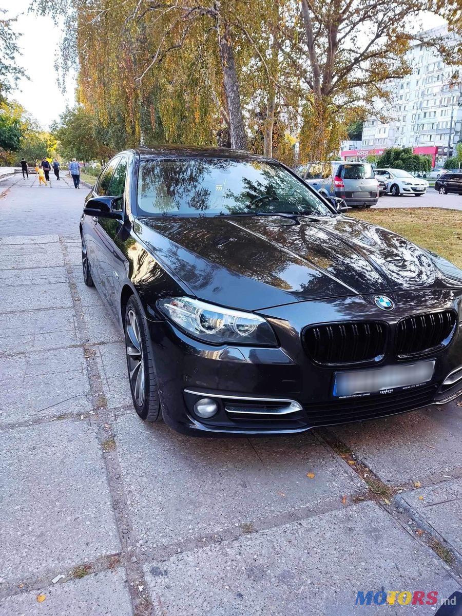 2014' BMW 5 Series photo #1