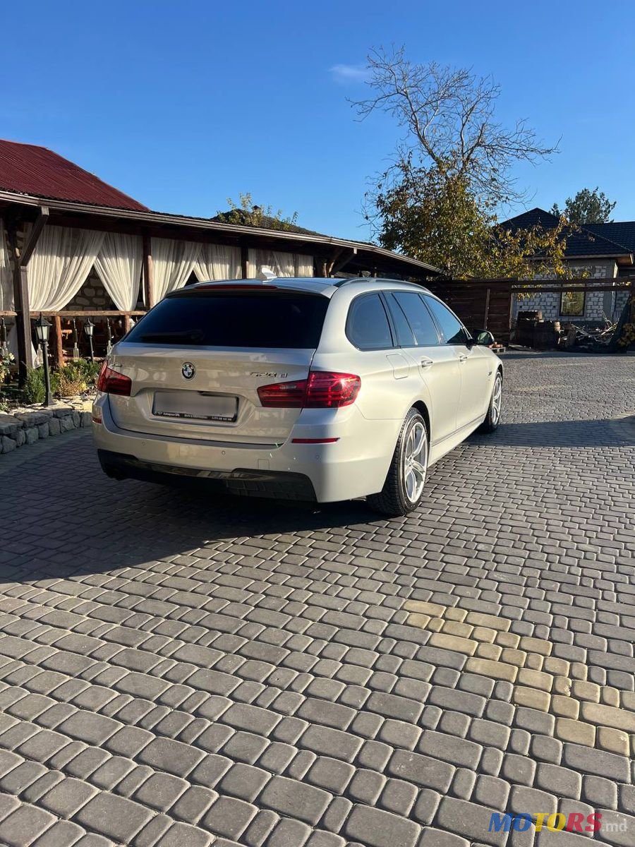 2015' BMW 5 Series Touring photo #3