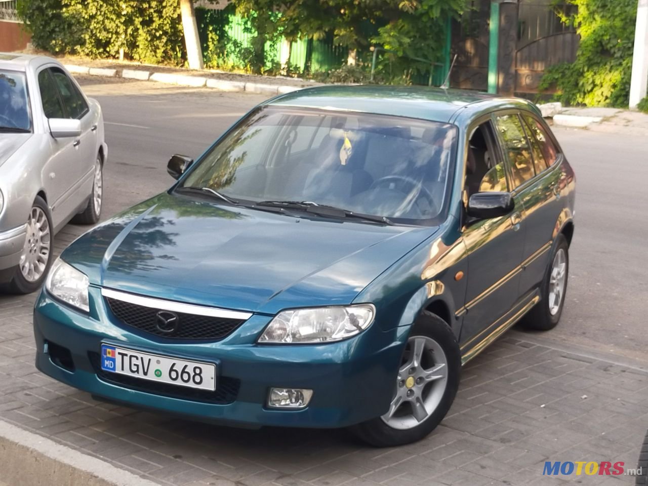 2002' Mazda 323 photo #5