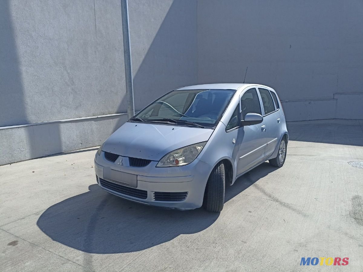 2004' Mitsubishi Colt photo #1