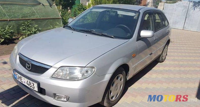 2002' Mazda 323 photo #1