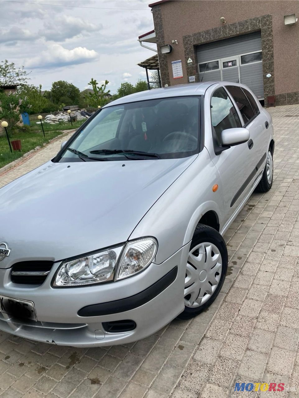 2002' Nissan Almera photo #1