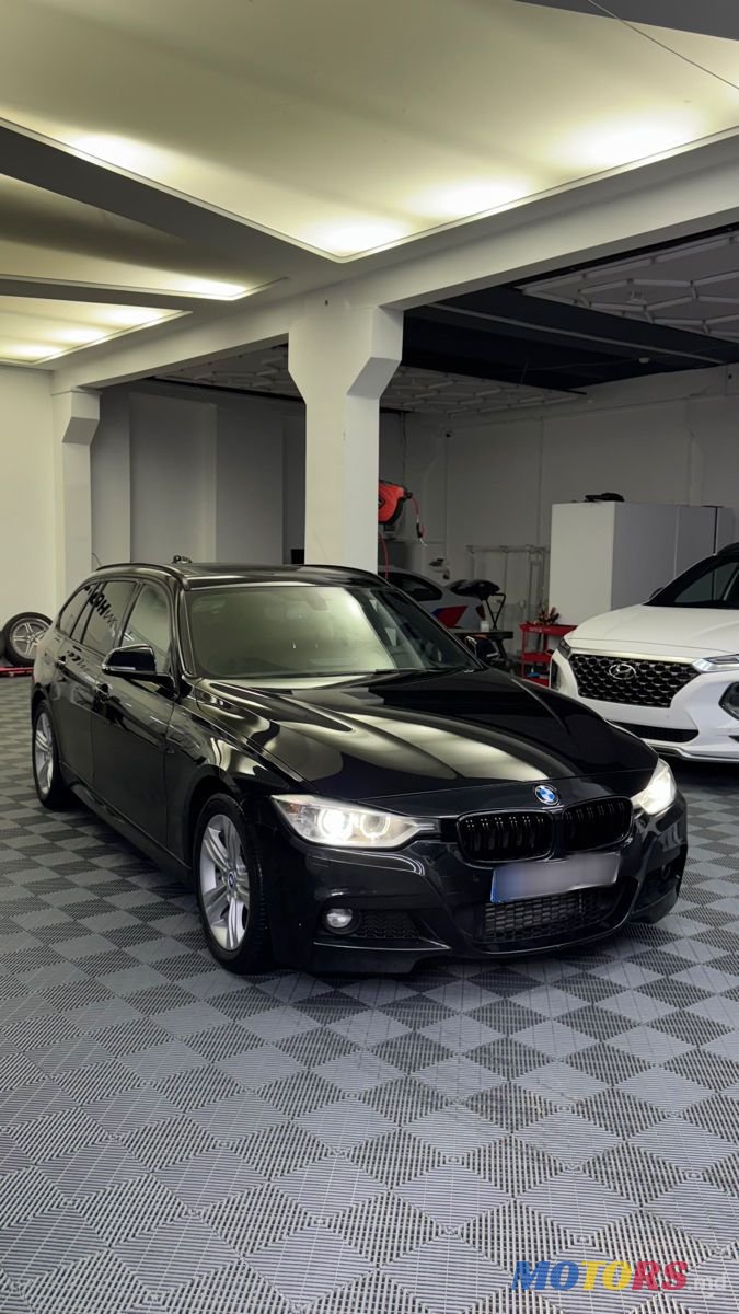 2013' BMW 3 Series Touring photo #2