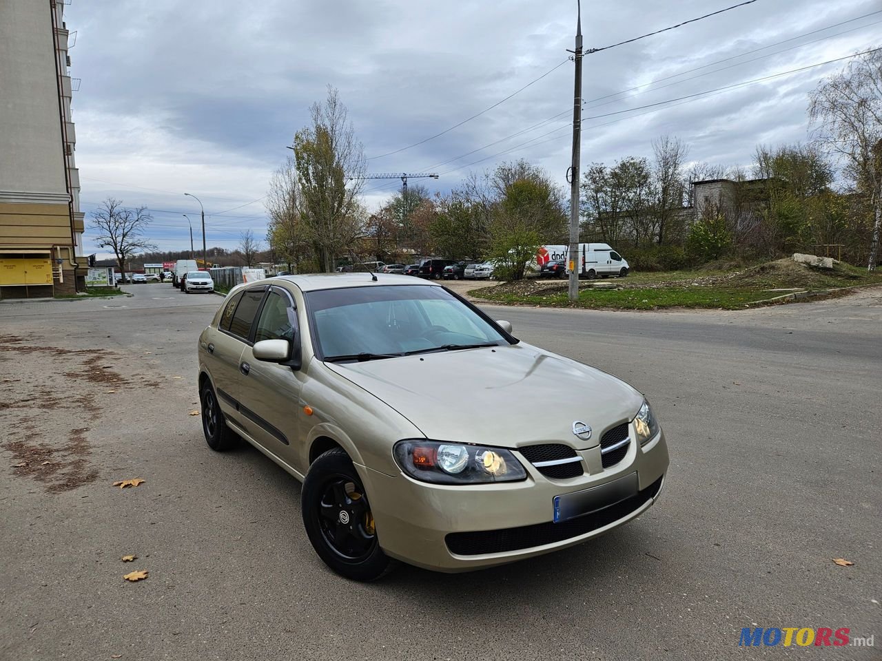 2004' Nissan Almera photo #2