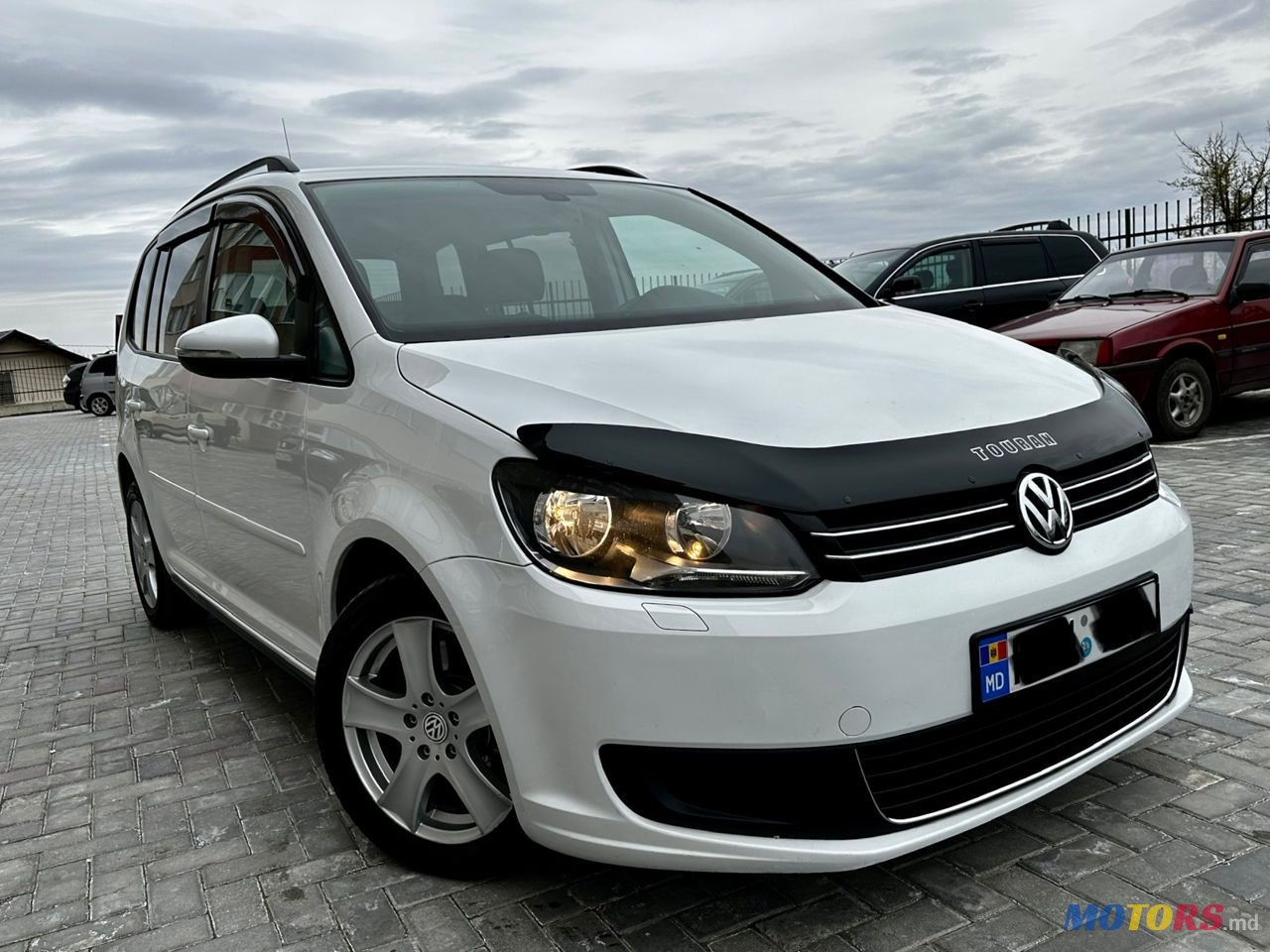 2014' Volkswagen Touran photo #1