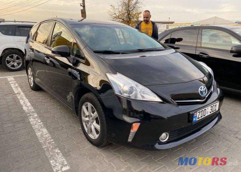 2013' Toyota Prius + photo #1