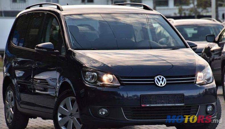 2012' Volkswagen Touran photo #1