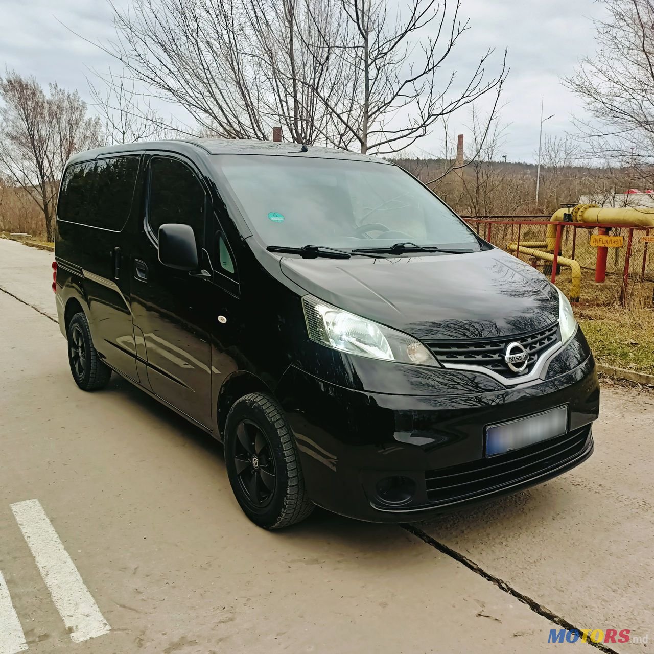 2011' Nissan NV200 photo #1