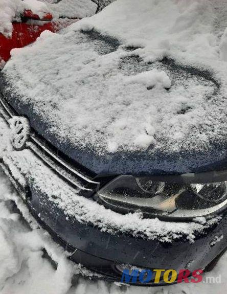 2011' Volkswagen Touran photo #1